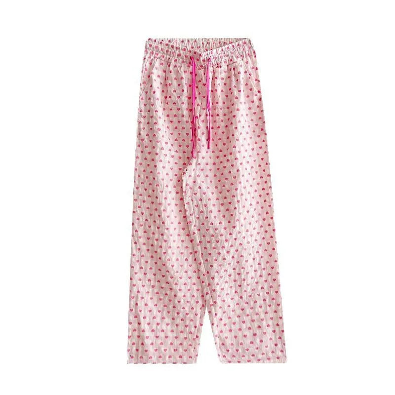 Comfortable home-style heart-printed pajama pants 2025 new casual family pants. The pink pants can be worn as a coat