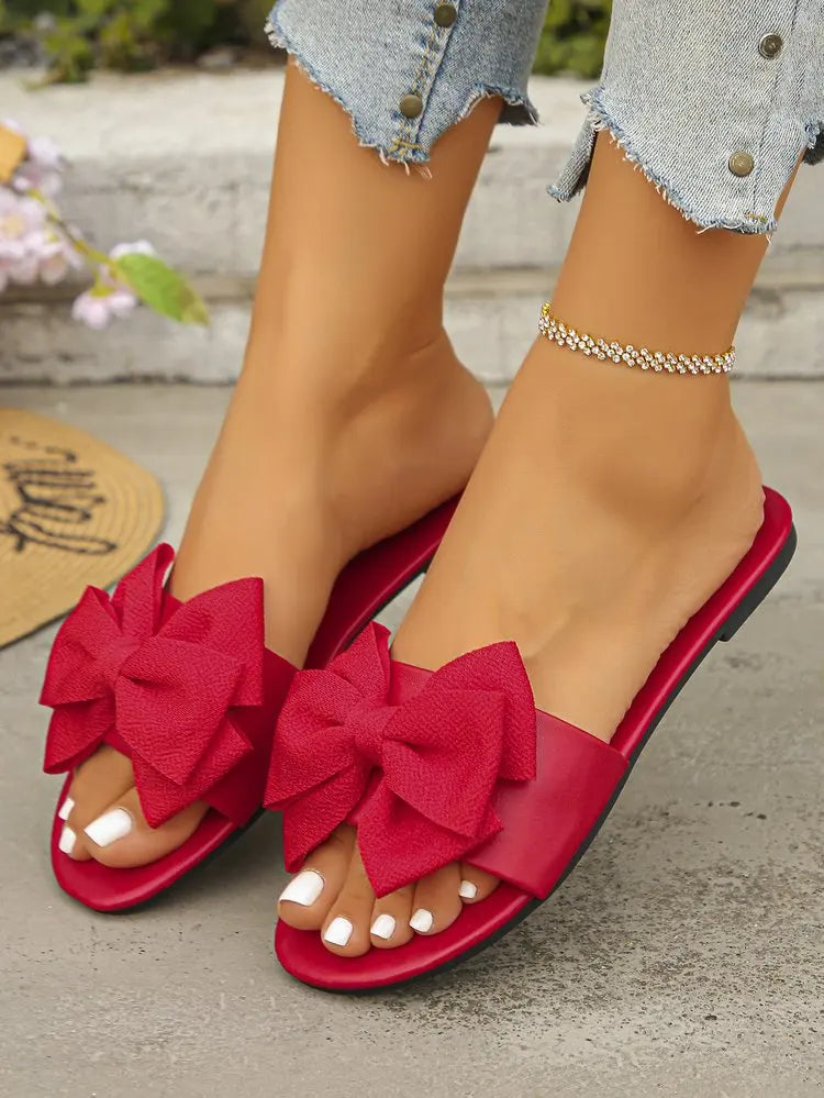 Womens Slip on Flat Sandals Big Bowknot Wide Strap Slides Mules Open Toe Casual Sweet Summer Beach Comfort Daily Walking Shoes