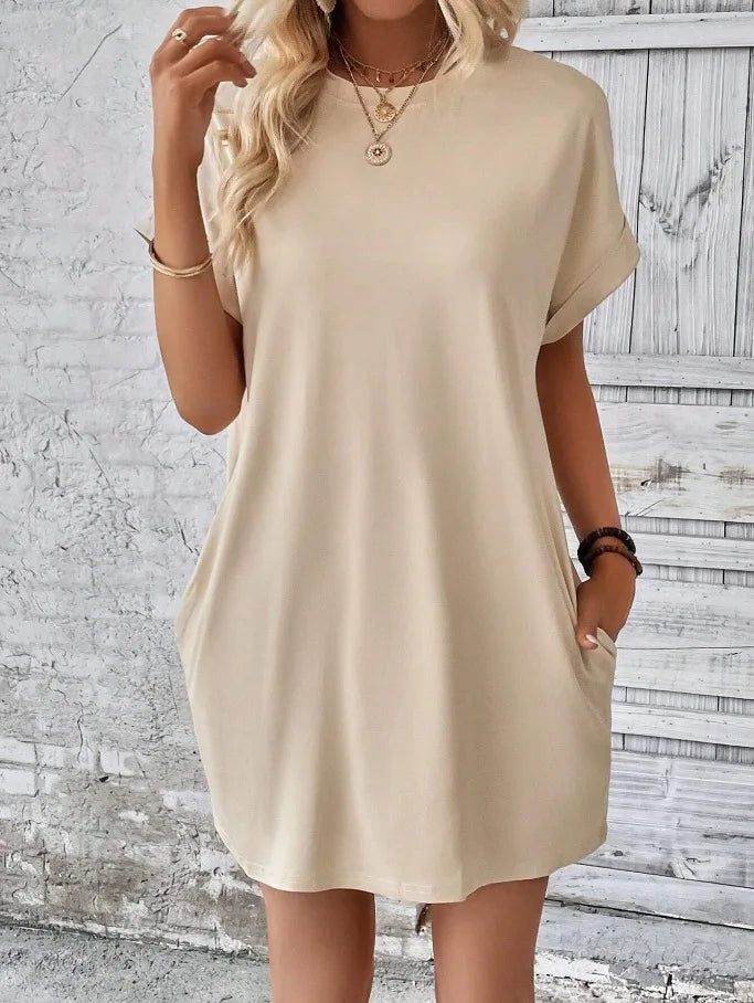 New women's spring and summer fashionable temperament casual commuting solid color round neck loose short sleeved pocket dress