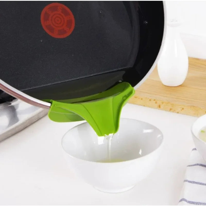 Kitchen Tools Designed to Prevent Spills, Including Pots with Round Openings, Edge Guards,  And Various Small Kitchen Gadgets