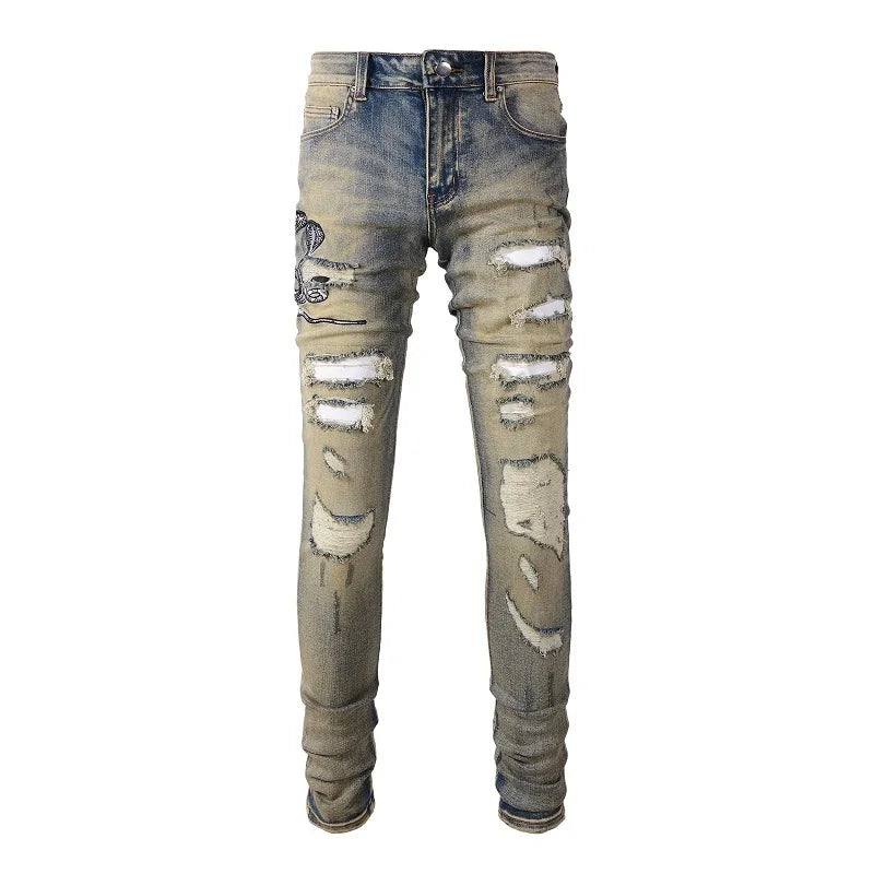 2026 New Men's Fashion Snake Embroidery Denim Jeans Vintage Blue Snakeskin Leather Patch Stretch Pants Skinny Tapered Trousers