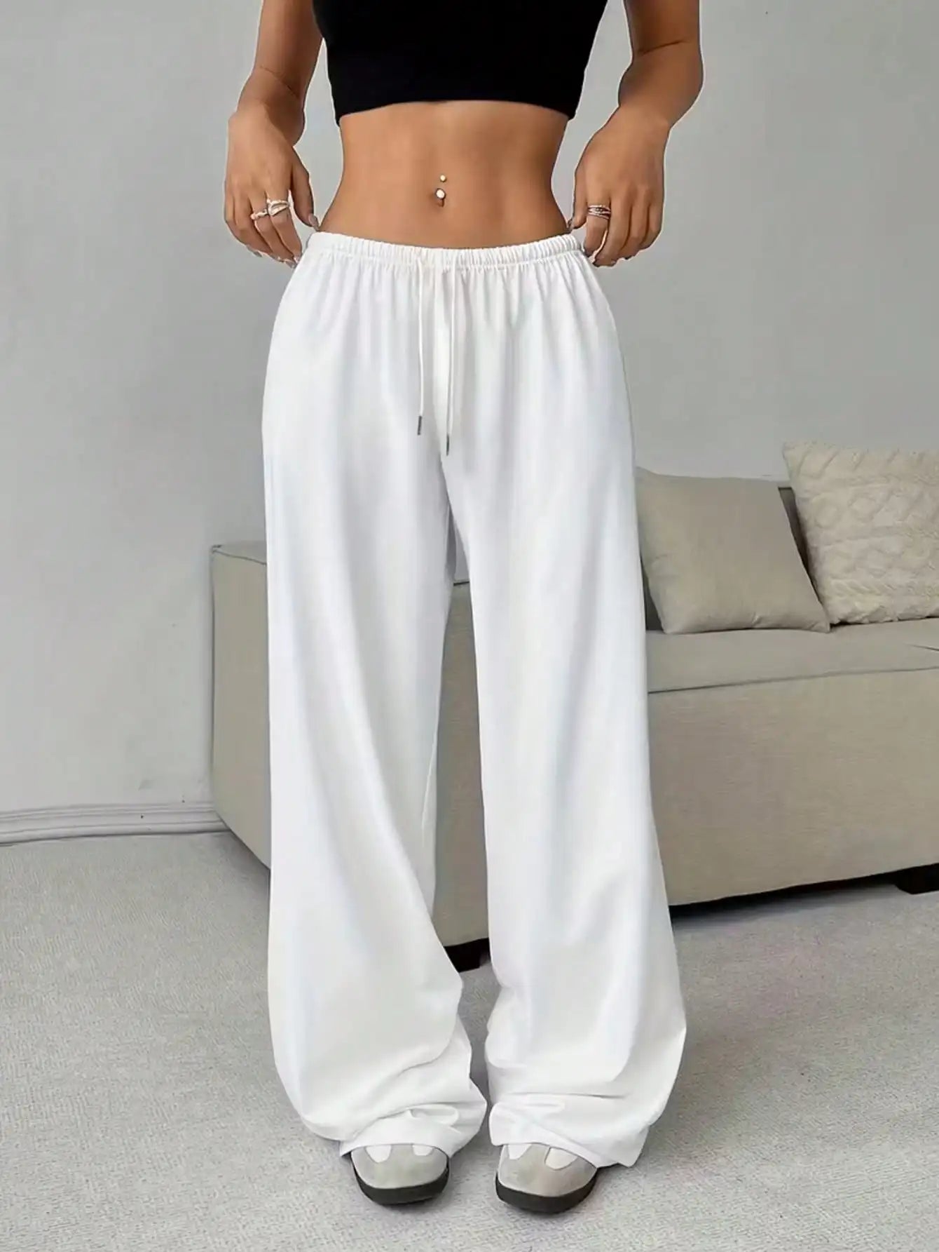 Ladies' casual wide-leg jogging pants, featuring a drawstring elastic waistband, comfortable and loose fit, and a popular style