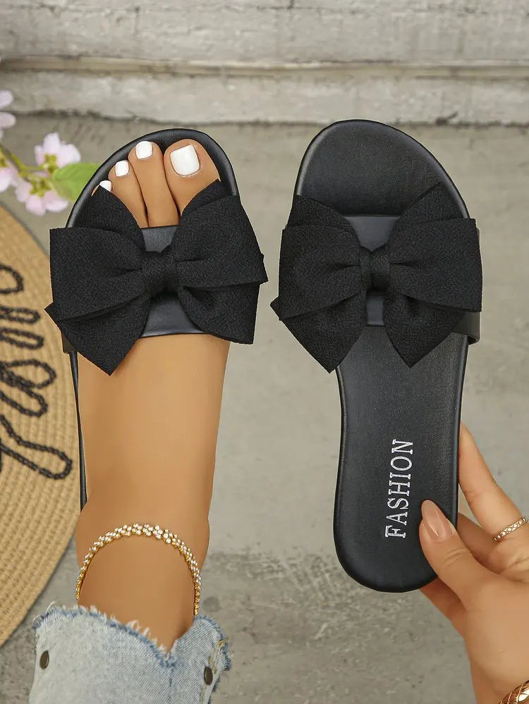 Womens Slip on Flat Sandals Big Bowknot Wide Strap Slides Mules Open Toe Casual Sweet Summer Beach Comfort Daily Walking Shoes