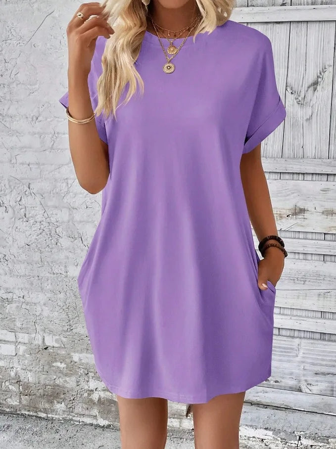 New women's spring and summer fashionable temperament casual commuting solid color round neck loose short sleeved pocket dress