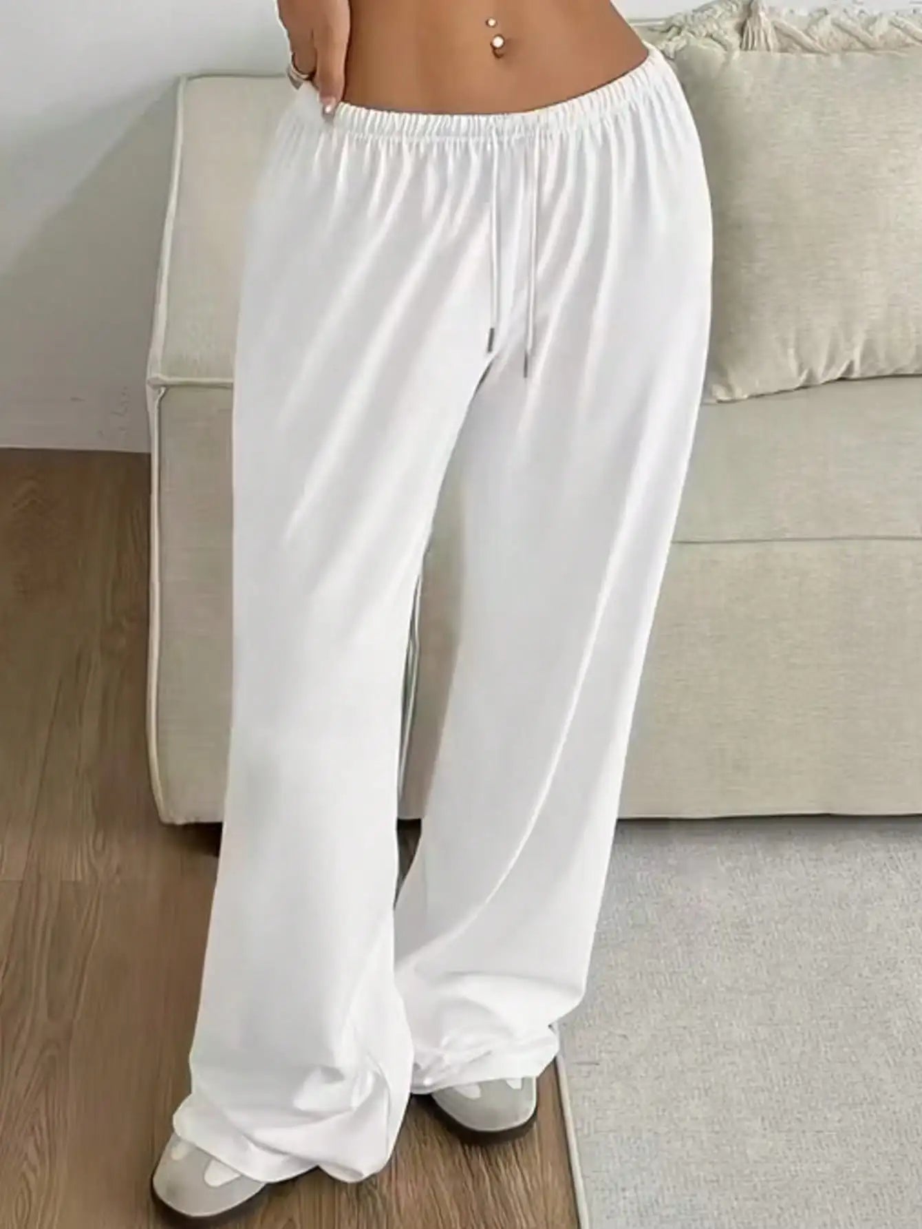 Ladies' casual wide-leg jogging pants, featuring a drawstring elastic waistband, comfortable and loose fit, and a popular style