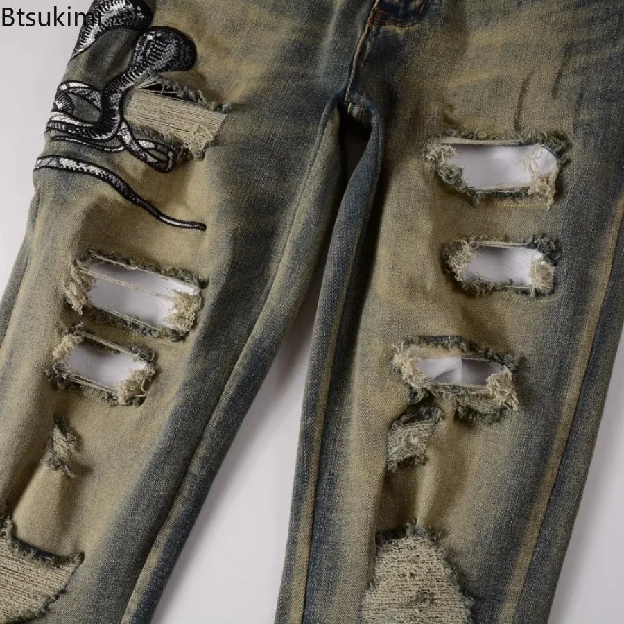 2026 New Men's Fashion Snake Embroidery Denim Jeans Vintage Blue Snakeskin Leather Patch Stretch Pants Skinny Tapered Trousers