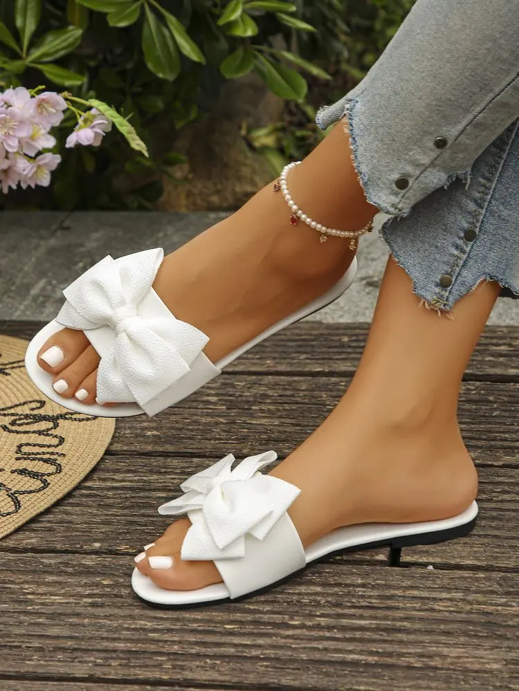 Womens Slip on Flat Sandals Big Bowknot Wide Strap Slides Mules Open Toe Casual Sweet Summer Beach Comfort Daily Walking Shoes