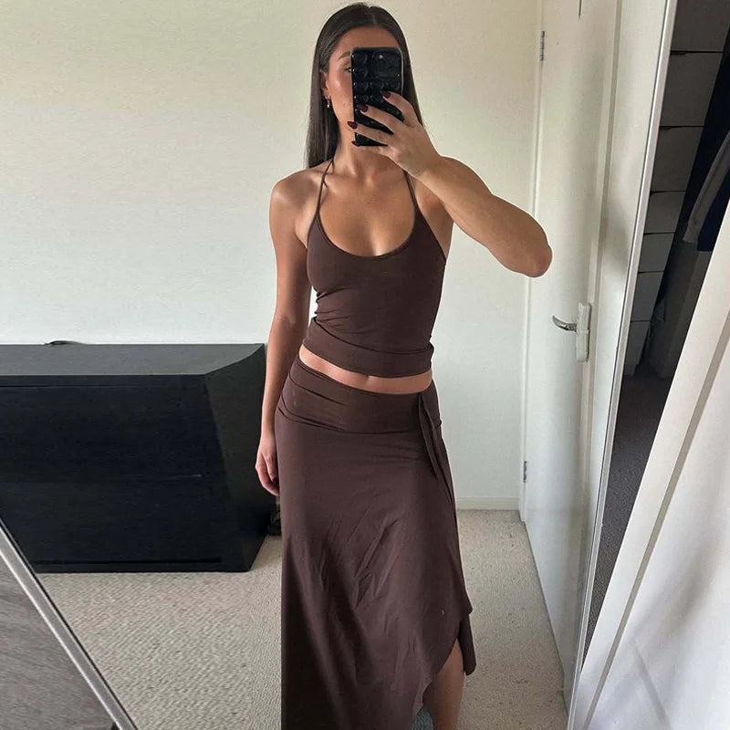 Hugcitar Fashion 2 Pcs Sets Halter Solid Backless Lace Up Sexy Crop Tank Top Ruched Maxi Skirt Women Outfit Beach Vacation Sport