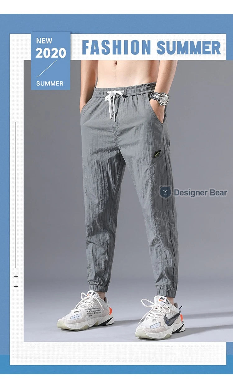 2026 Summer Thin Men's Wrinkled Fabric Loose Tapered Harem Pants Quick-Dry Elastic Cuff Casual Trousers Elastic Waist City Boy