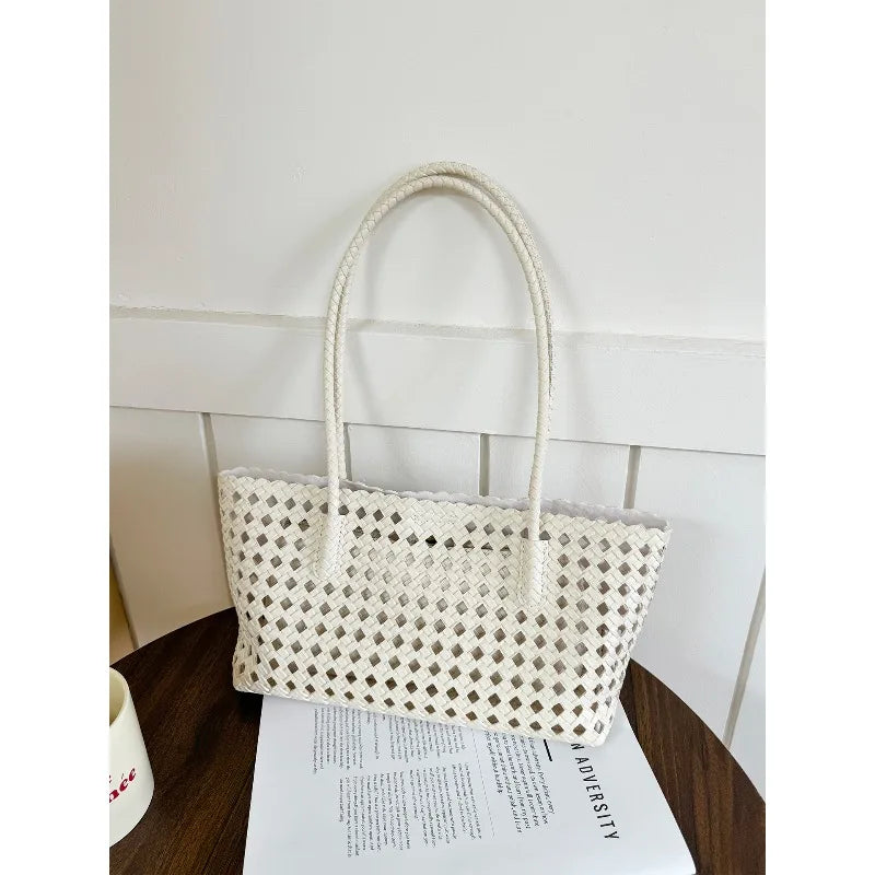 2026 New Fashion Hollow Out Woven Tote Bag for Women Large Capacity Commute Single Shoulder Handbag for Summer
