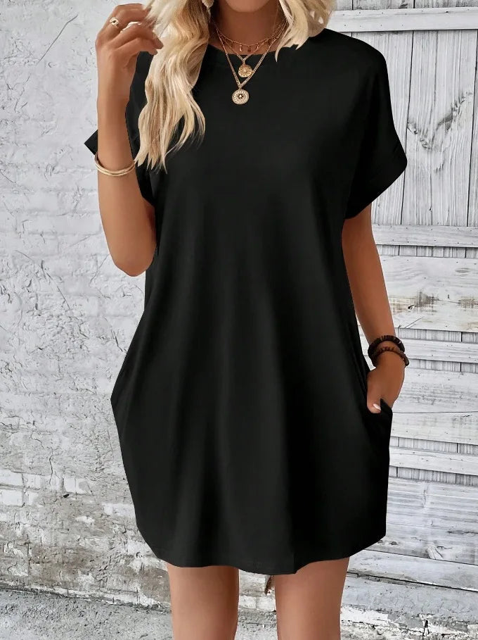 New women's spring and summer fashionable temperament casual commuting solid color round neck loose short sleeved pocket dress