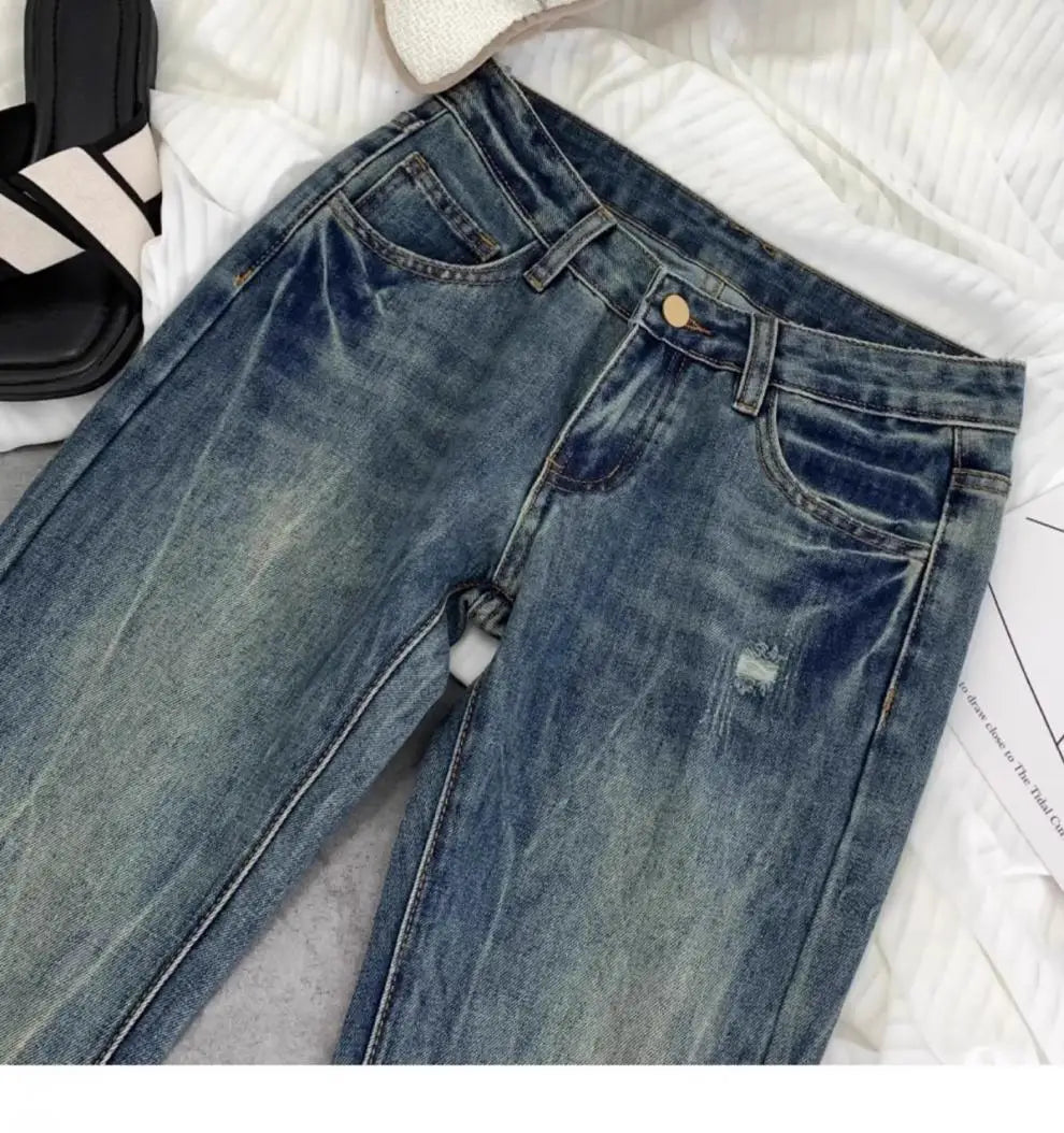 American retro low-waisted jeans female autumn new embroidery old casual fashion temperament slim Joker bell bottoms.